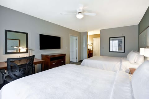 Suite, 2 Queen Beds | Hypo-allergenic bedding, down comforters, desk, laptop workspace