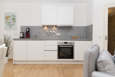 Apartment, 2 Bedrooms (EG) | Private kitchen | Fridge, stovetop, dishwasher, coffee/tea maker