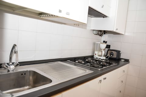 Apartment, 1 Bedroom, Balcony (2-4 Pax) | Private kitchen | Fridge, stovetop, electric kettle, toaster