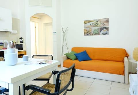 Apartment, 1 Bedroom | Living area | Flat-screen TV