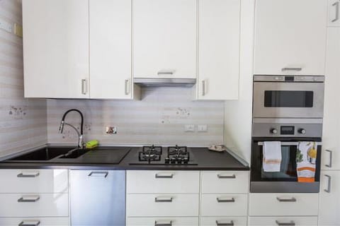 Apartment, 2 Bedrooms | Private kitchen | Full-size fridge, microwave, oven, stovetop
