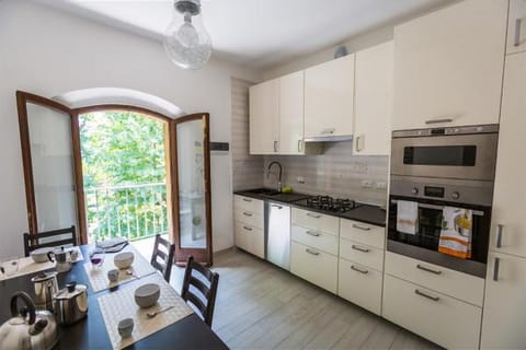 Apartment, 2 Bedrooms | Private kitchen | Full-size fridge, microwave, oven, stovetop