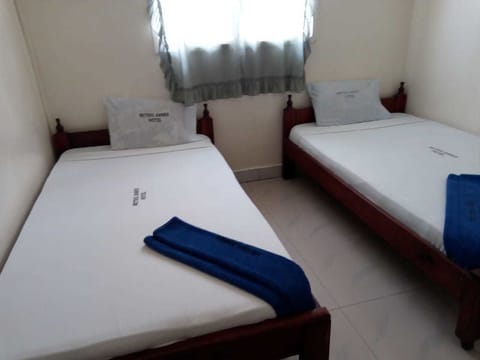 Standard Triple Room, 3 Twin Beds, Non Smoking, City View | Desk, free WiFi, bed sheets