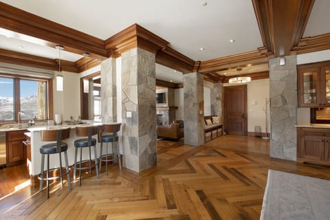 Hardwood Flooring - Intricately laid hardwood flooring throughout the entry, dining, bar and living areas.