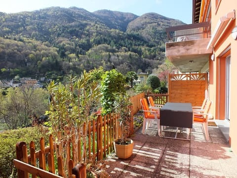 Sheltered, enclosed garden patio in front of the apartment