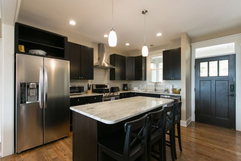 Fully stocked kitchen in an open concept room to enjoy the whole family.