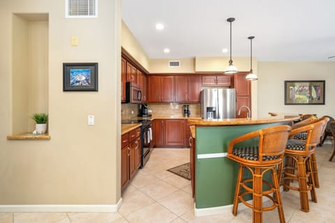 Full kitchen with granite countertops and stainless appliances