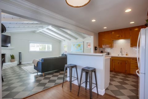 Also features an island with hightop seating for two.