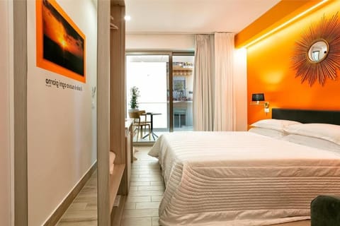 Deluxe Double Room, Courtyard View | Hypo-allergenic bedding, minibar, in-room safe, individually decorated