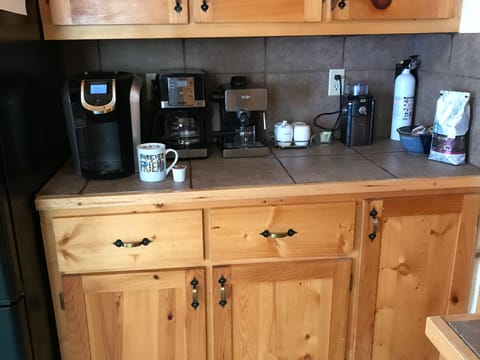 Coffee bar with coffee your way, including espresso machine.