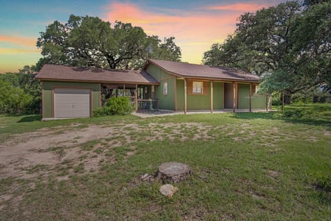 Sunset views from your charming countryside escape! . This cozy vacation rental offers the perfect blend of rustic charm and modern comfort."