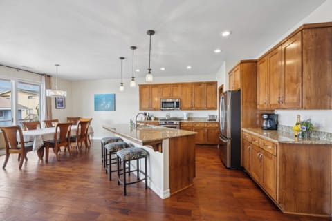 Large open kitchen, dining, living area. PERFECT for entertaining.