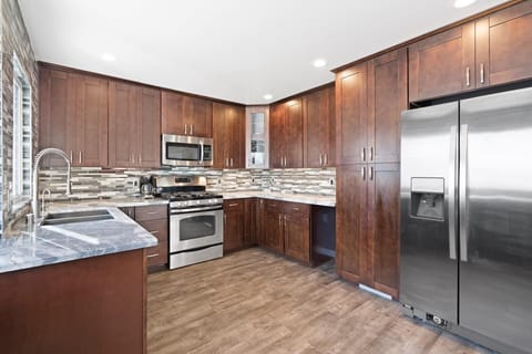 Kitchen is fully-stocked with dishes, cooking, baking and meal prep gear. All standard large and small appliances included. See listing description for more supply details.