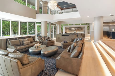Another view of the great room highlights its expansive layout, with tall ceilings