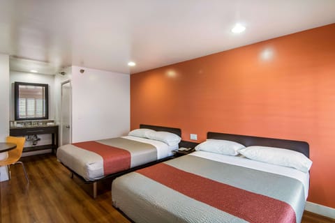 Deluxe Room, 2 Queen Beds, Non Smoking, Refrigerator & Microwave | Pillowtop beds, individually furnished, desk, iron/ironing board