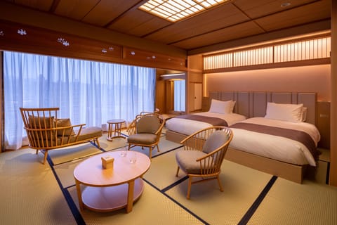 Japanese-Style Deluxe Room with Open-Air Bath | In-room safe, desk, blackout drapes, iron/ironing board