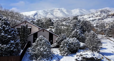 Our lovely home in winter -nestled in the pines in the foothills of the Rockies.