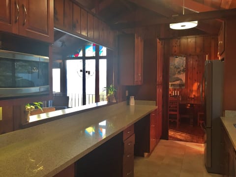 Newly redone kitchen with stainless steel appliances.