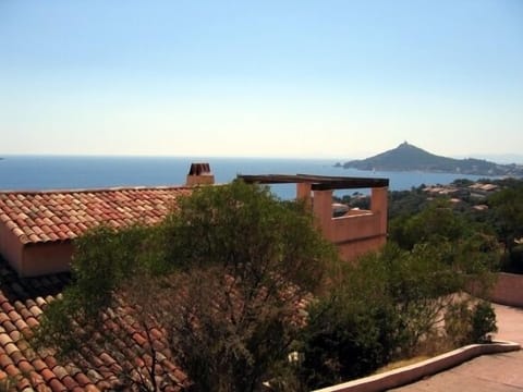 View over the roof of the villa and with Dramont in the background.