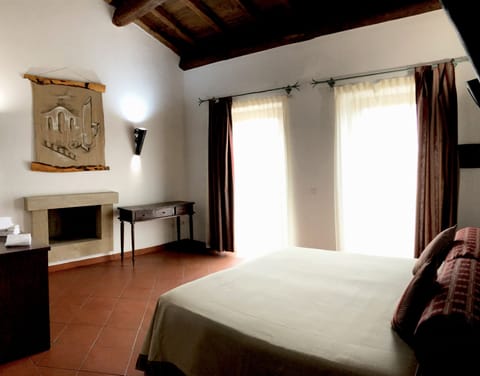 Superior Quadruple Room, Pool Access, Garden View (003) | Free minibar, in-room safe, individually decorated, desk