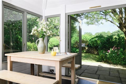 Beautiful conservatory style dining area with direct access to the garden