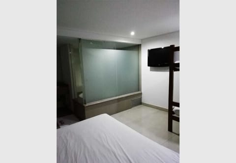 Deluxe Quadruple Room, Multiple Beds, Hot Tub (Air conditioner) | Blackout drapes, iron/ironing board, free WiFi, bed sheets