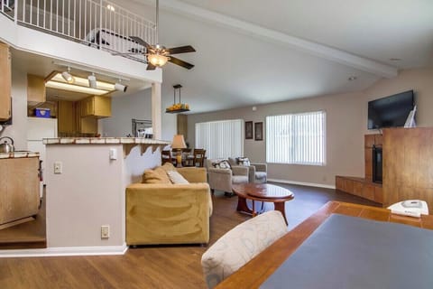 Open style floor plan with kitchen, dining area, living room and upstairs loft