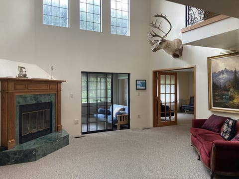 Entry leads to porch and living room