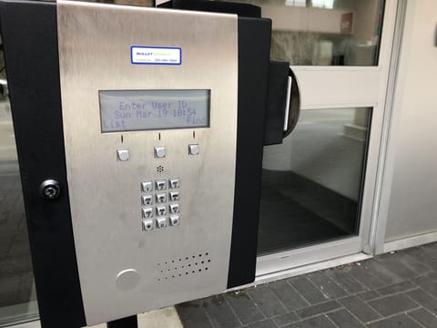 Press 501 so we can let you in remotely. Elevator to 5th floor is also activated