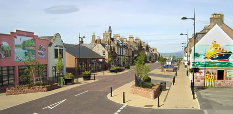 Invergordon High Street depicting first two murals