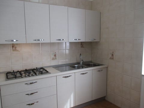 Apartment, 2 Bedrooms, Kitchen (Vivere) | Private kitchen | Full-size fridge, stovetop, cookware/dishes/utensils