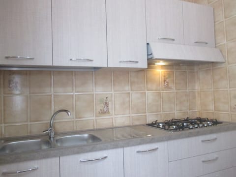 Apartment, 2 Bedrooms, Kitchen (Sally) | Private kitchen | Full-size fridge, stovetop, cookware/dishes/utensils