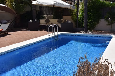 The pool and relaxation area for drinks snacks