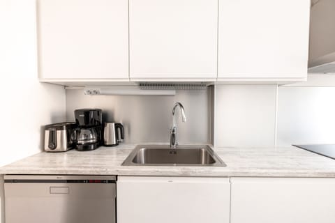 Deluxe Apartment, 1 Bedroom, Courtyard View | Private kitchen | Full-size fridge, microwave, oven, stovetop