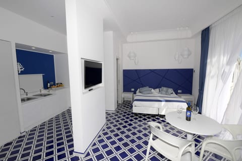 Family Suite, 2 Queen Beds, Sea View | Premium bedding, minibar, in-room safe, individually decorated