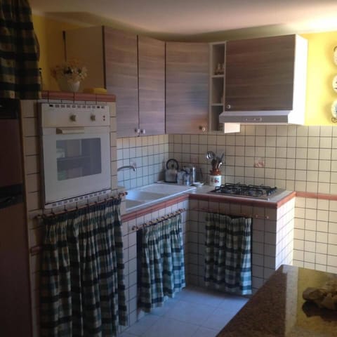 Fridge, stovetop, toaster, cookware/dishes/utensils