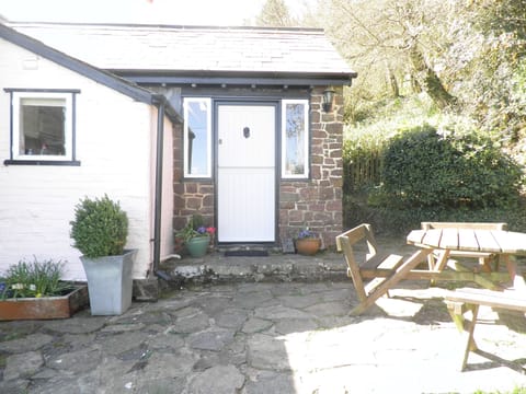 Patio area in garden has fabulous sea views