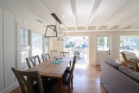 Dining table opens to seat 10. French doors open to patio and outside table. BBQ