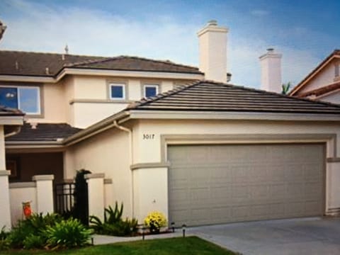 Welcome to our twin home.  Entrance with private gate and sitting area.