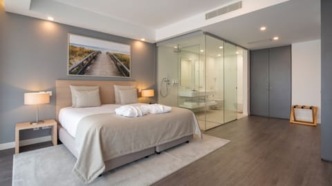 Panoramic Suite, Partial Sea View | Minibar, in-room safe, desk, soundproofing