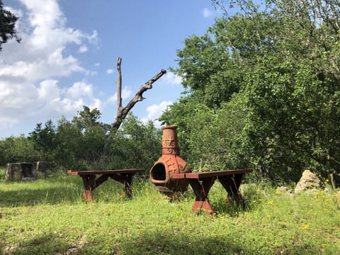 The chimenea-a pot-bellied outdoor fireplace-is the perfect spot for roasting up a snack amid animated conversation!