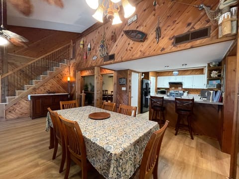 Dining Room table and kitchen.