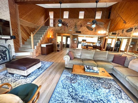 Living room, fireplace, TV, dining table