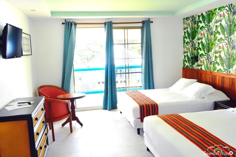 Comfort Quadruple Room, 2 Queen Beds, Non Smoking | In-room safe, free WiFi, bed sheets