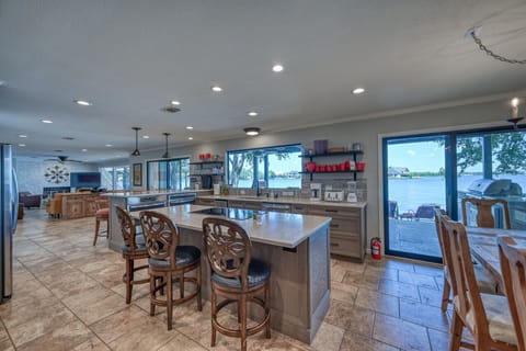 large great room.   lake views across entire back of house. Bar seating for 6.