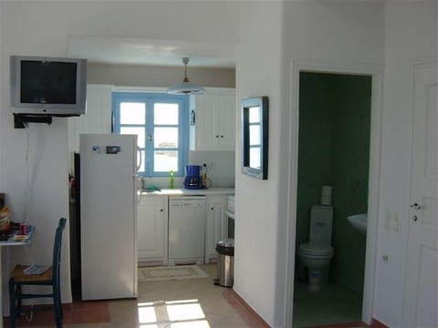View to kitchen and half bathroom.
