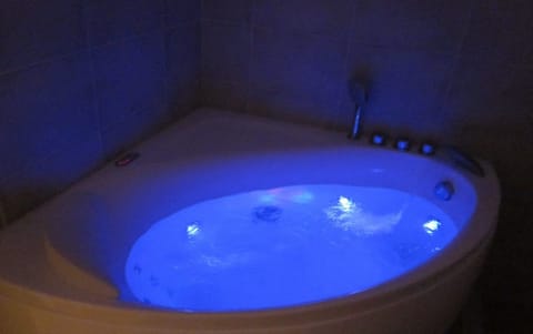 Separate tub and shower, deep soaking tub, hydromassage showerhead