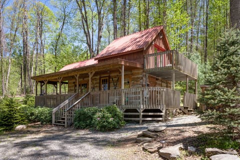 Large wrap around covered porch and private upper deck off bedroom.