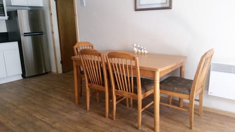Dining table with 4 padded chairs
