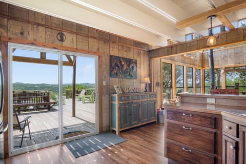 "Seamless indoor-outdoor living with direct access to the deck and stunning views."